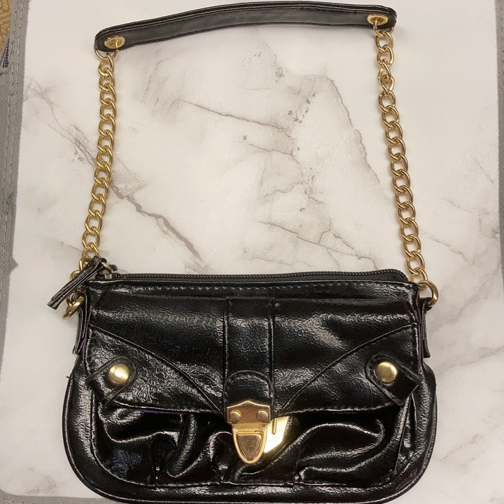 Black faux leather clutch with strap and zipper